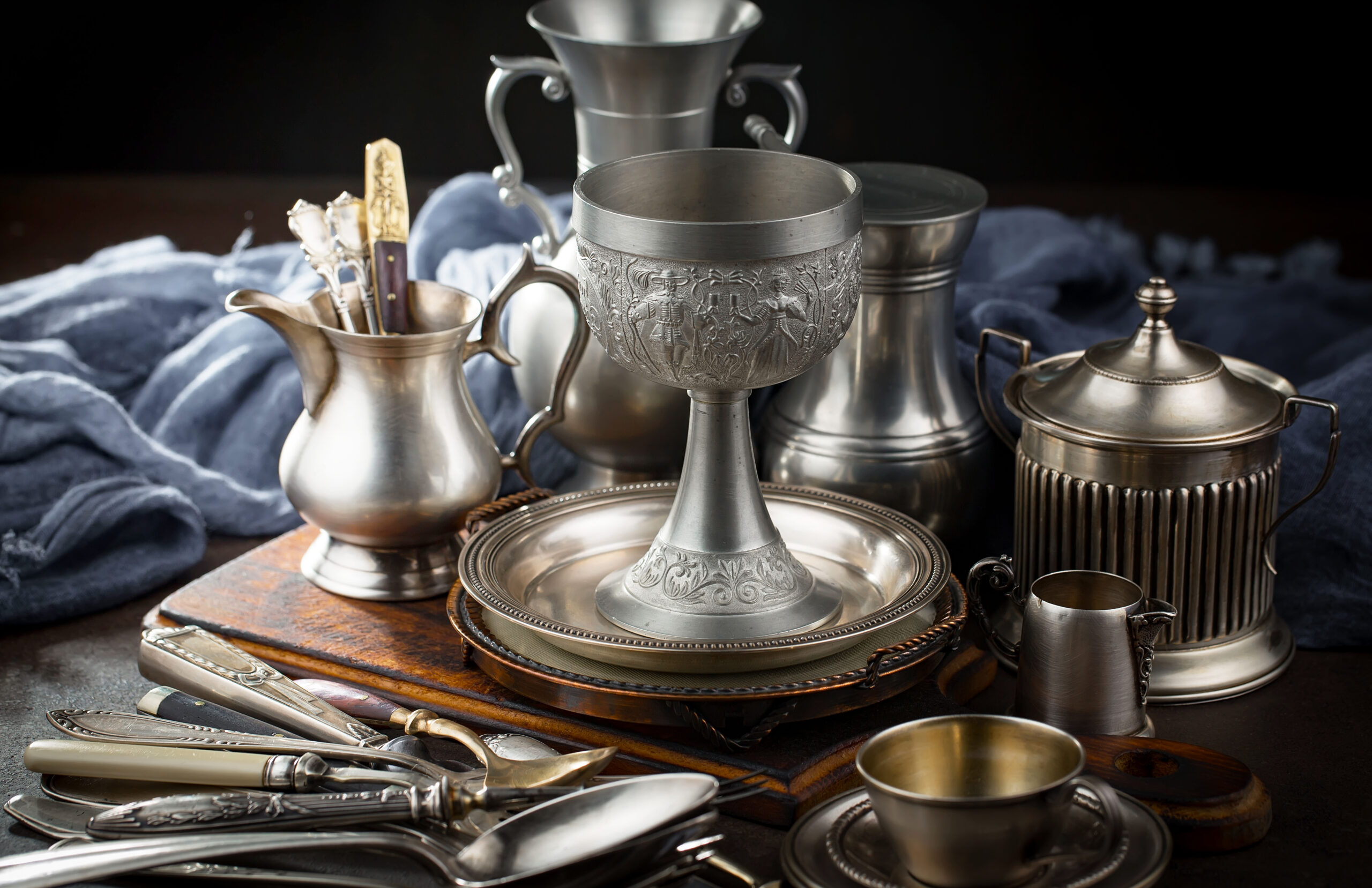silver-dishes-old-table